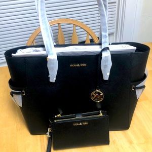Brand new Michael Kors large drawstring leather travel tote with matching wallet